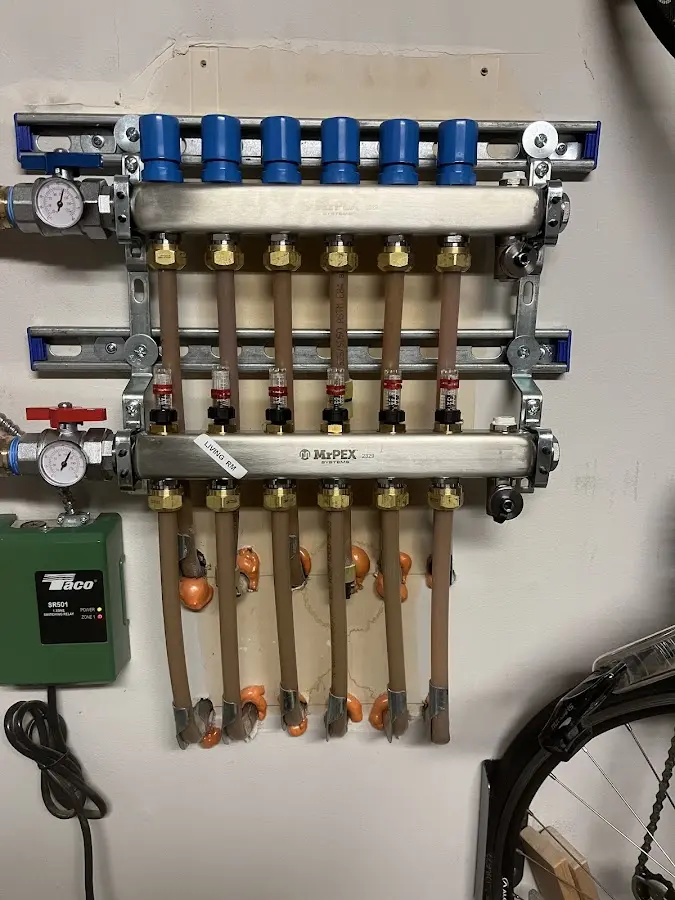 Plumber performing Gas Leak Detection at a residential property in Greene